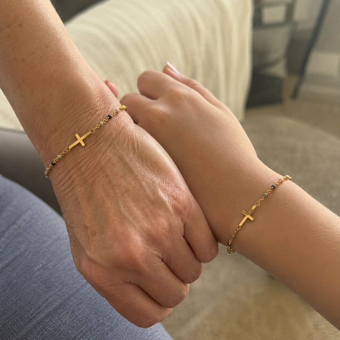 A cross on your wrist. A quiet reminder all day long.